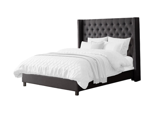 Dark grey tufted queen bed with plush upholstery, featuring a high, button-tufted headboard and sturdy wooden legs, perfect for modern bedroom decor.