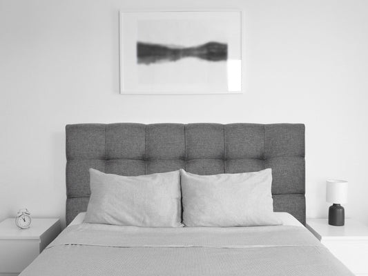 Grey twin headboard with modern design, upholstered in soft fabric, featuring clean lines and minimalist style, perfect for contemporary bedrooms.