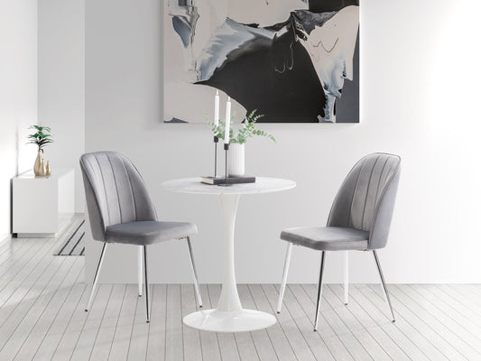 Grey velvet dining room chairs, set of 2, featuring sleek metal legs, plush upholstery, and a modern design. Ideal for contemporary dining spaces, these chairs offer both comfort and style.
