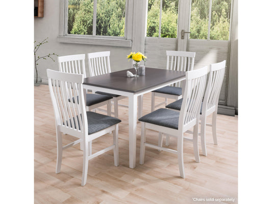 Grey and white dining table with sleek, modern design, featuring a smooth grey tabletop and sturdy white legs, ideal for contemporary dining rooms and kitchens.