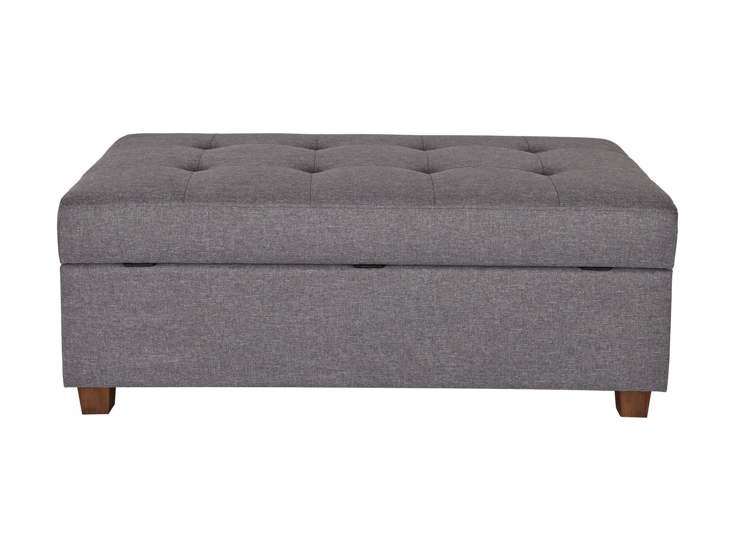 Light grey large storage ottoman with tufted top, soft fabric upholstery, and wooden legs. Ideal for living rooms or bedrooms, providing extra seating and hidden storage space.