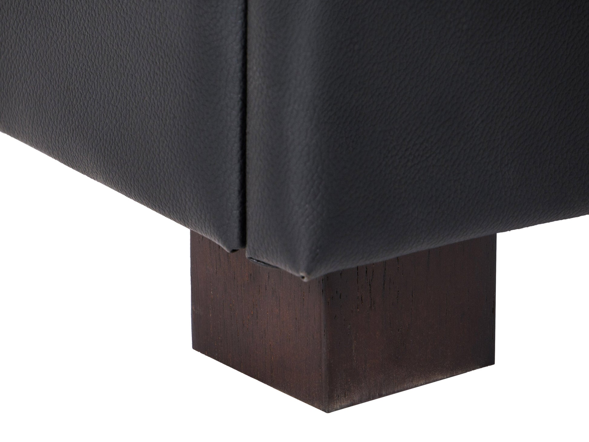 Brown vegan leather storage ottoman with tufted top, wooden legs, and spacious interior storage compartment.