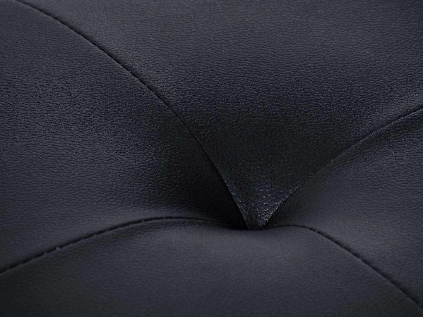 Brown vegan leather storage ottoman with tufted top, wooden legs, and spacious interior storage compartment.