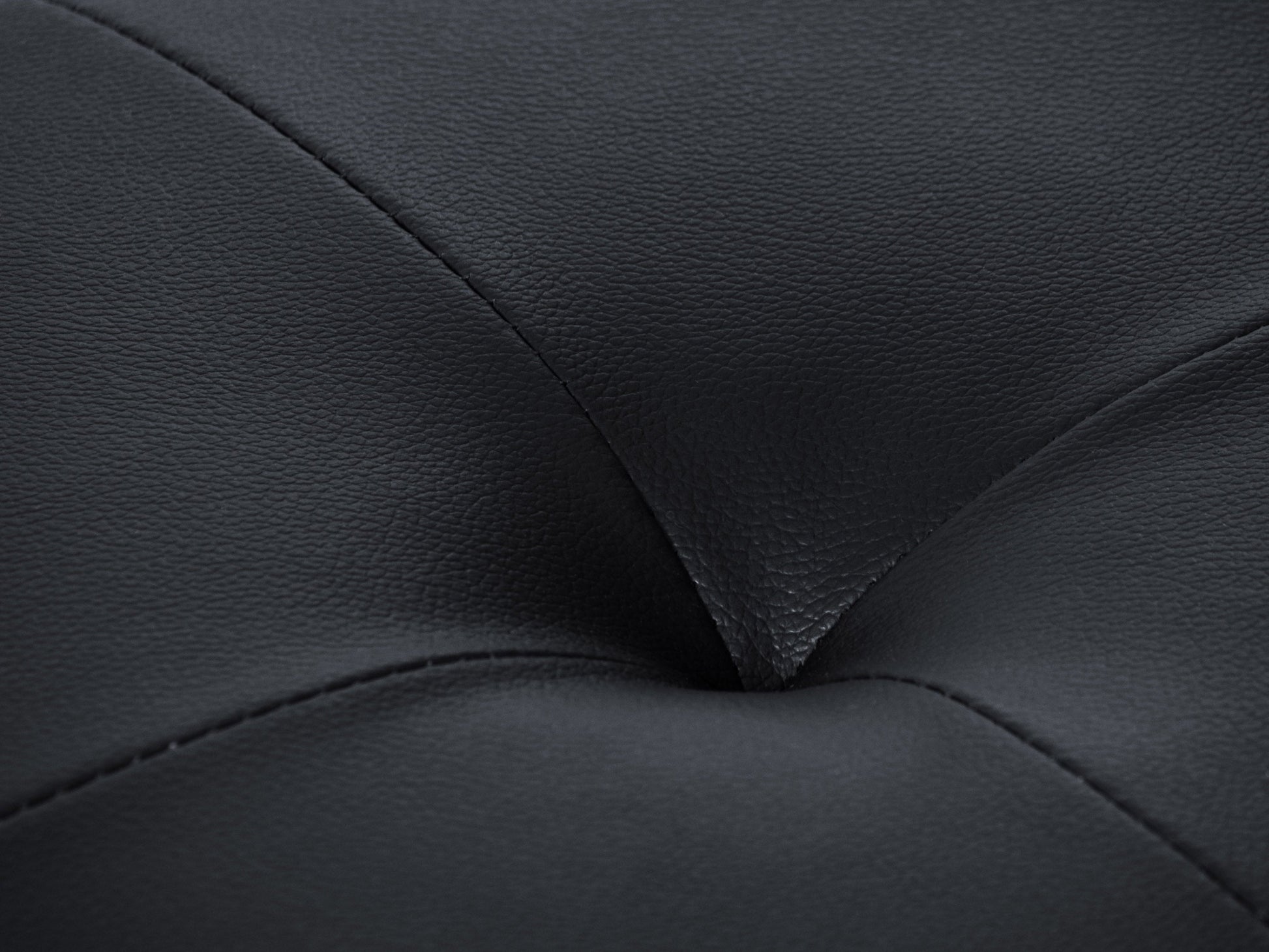 Brown vegan leather storage ottoman with tufted top, wooden legs, and spacious interior storage compartment.