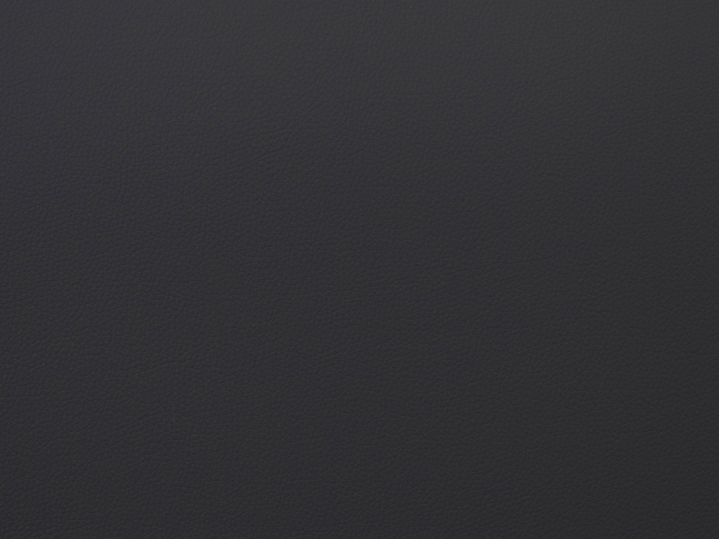 Brown vegan leather storage ottoman with tufted top, wooden legs, and spacious interior storage compartment.