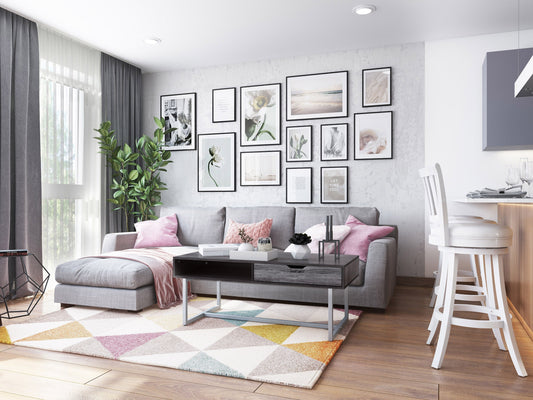 Modern rectangular coffee table in grey with a sleek, minimalist design featuring a smooth, matte finish, sturdy metal legs, and a spacious surface perfect for living rooms or offices.