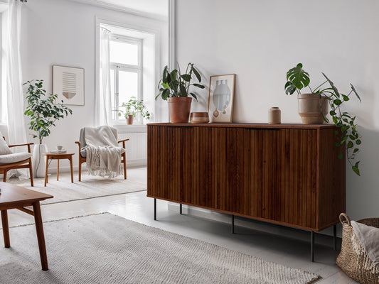Fluted walnut sideboard cabinet with brass handles, featuring a sleek design, rich walnut finish, and fluted texture. Ideal for living room or dining area storage.