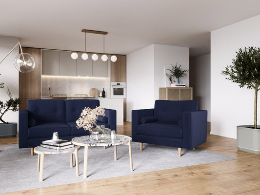 Navy blue mid-century modern arm chair with wooden legs, featuring a sleek design, plush upholstery, and button-tufted backrest. Ideal for living rooms or offices seeking stylish and comfortable seating.