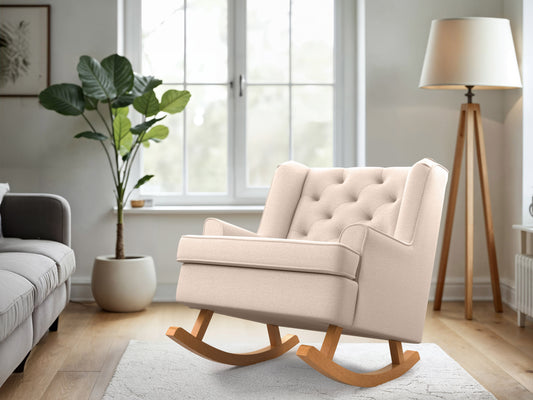 Beige rocking chair with a curved wooden frame, cushioned seat, and backrest, featuring soft fabric upholstery and ergonomic design, perfect for living rooms and nurseries.