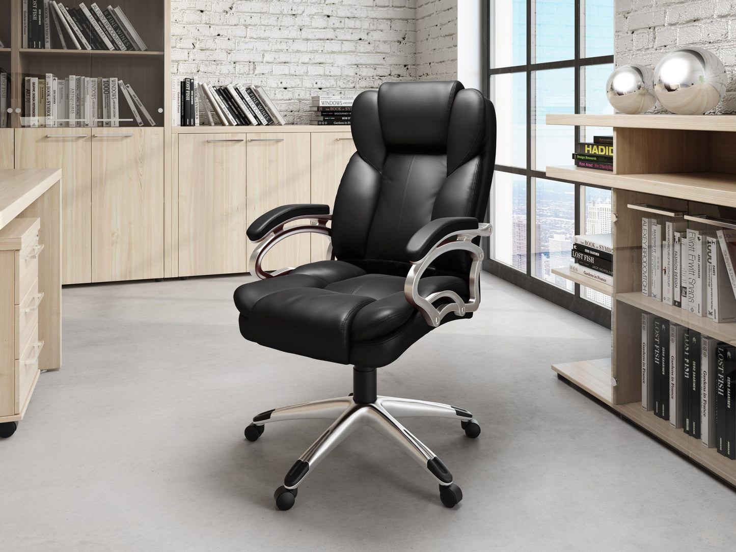 Ergonomic black leather executive office chair with padded armrests, high back support, adjustable height, and swivel base, ideal for home or corporate office setups.
