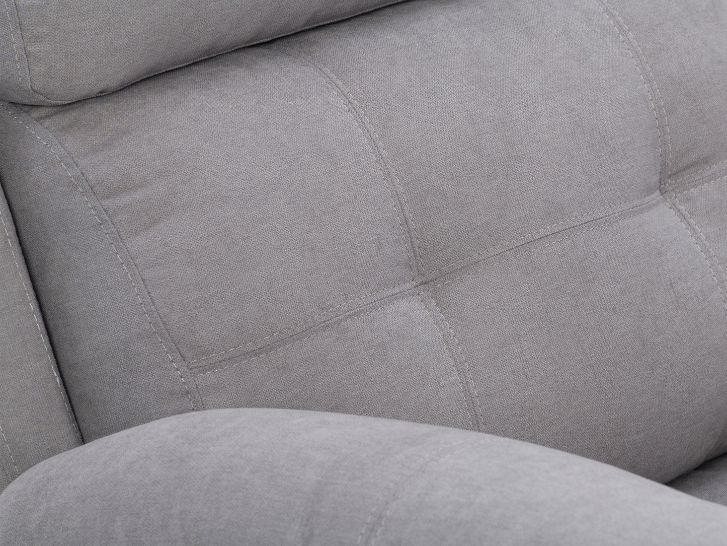 Extra wide light grey recliner with plush fabric, padded armrests, and a smooth reclining mechanism, perfect for living room comfort and relaxation.