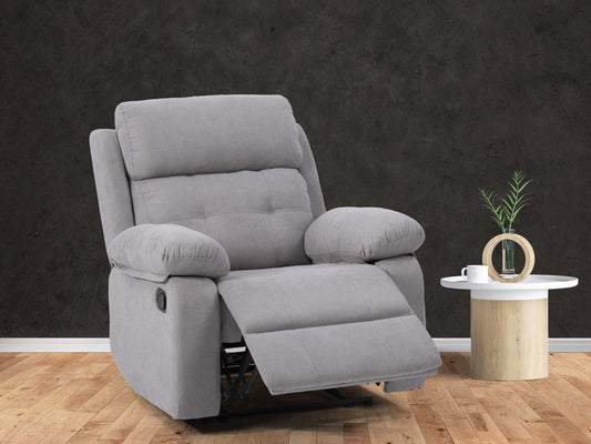 Extra wide light grey recliner with plush fabric, padded armrests, and a smooth reclining mechanism, perfect for living room comfort and relaxation.