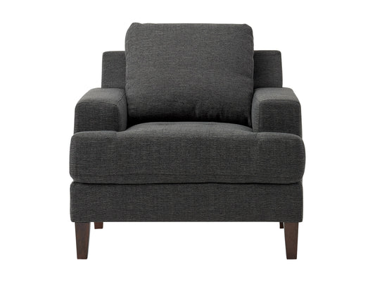 Dark grey mid-century armchair with wooden legs, upholstered in soft fabric, featuring a tufted backrest and padded seat, ideal for modern living rooms or offices.