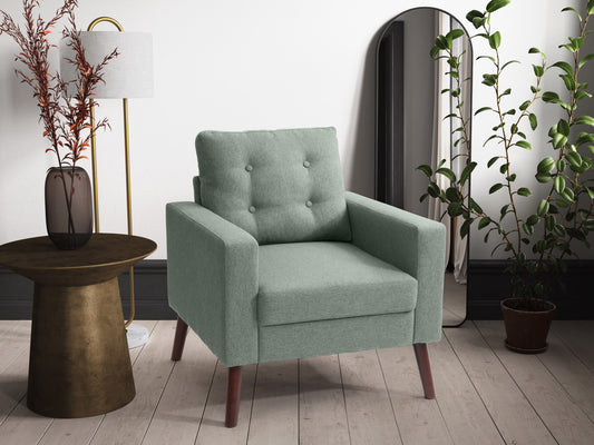 Green tufted accent chair with wooden legs, mid-century modern design, velvet upholstery, and button-tufted backrest.