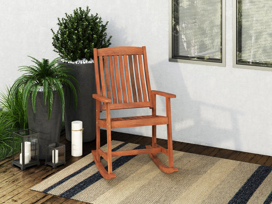 Brown outdoor rocking chair with curved wooden slats, ergonomic armrests, and sturdy frame. Ideal for patios and gardens, providing comfortable seating with a classic rustic design.