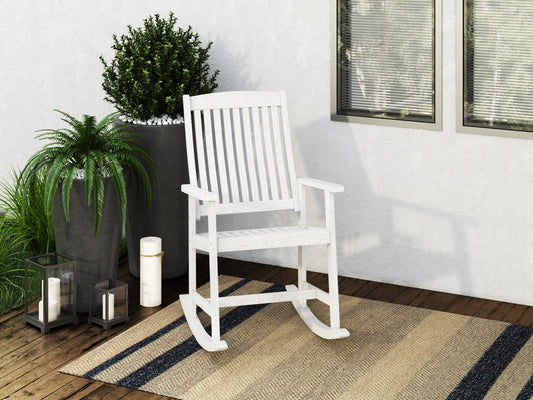 Washed white outdoor rocking chair with curved wooden slats, ergonomic armrests, and a weather-resistant finish perfect for patio relaxation.