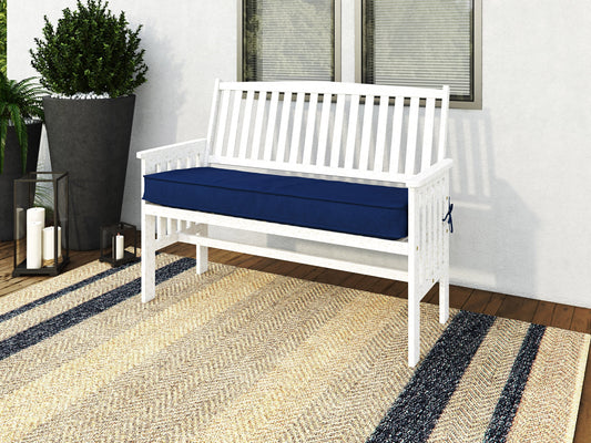 Washed white wood patio bench with backrest, featuring slatted seat and back, sturdy armrests, and weather-resistant finish, perfect for outdoor seating.