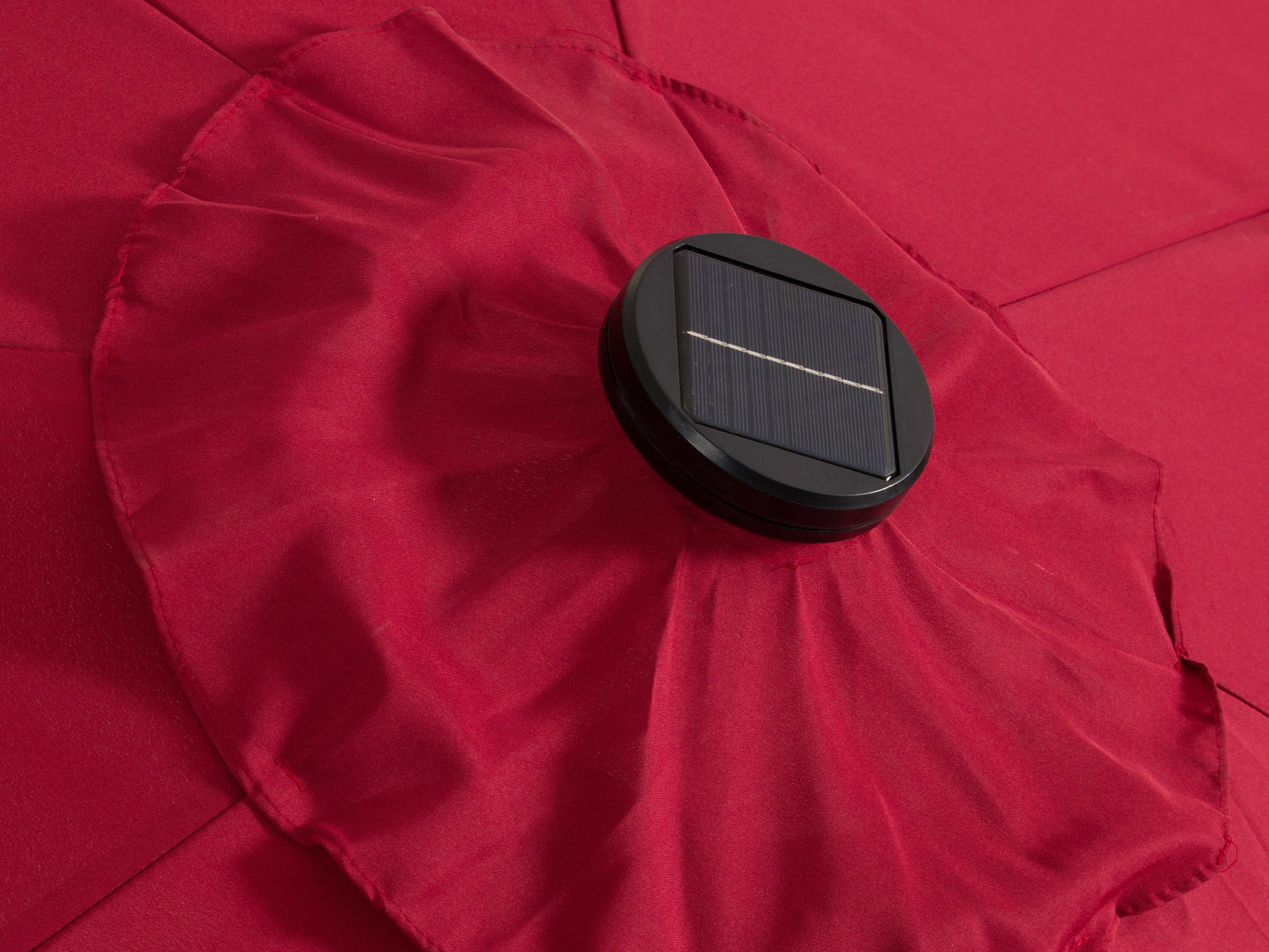 Burgundy 9ft patio umbrella with built-in LED lights, tilting feature, and sturdy aluminum pole, perfect for outdoor garden or patio use.