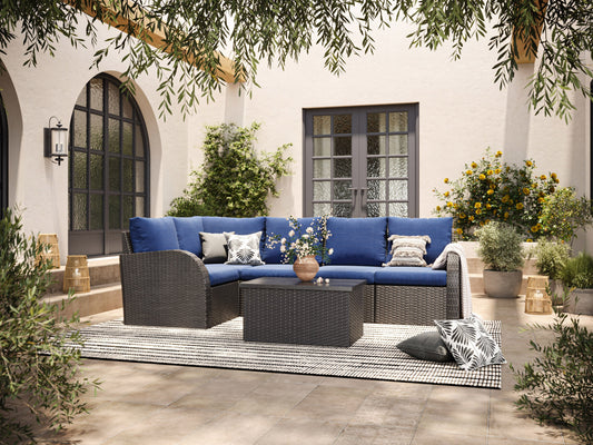 Blue outdoor sectional patio chair with left armrest, featuring weather-resistant fabric, sturdy metal frame, and plush cushions for comfort. Ideal for modern patio settings and relaxing outdoor spaces.