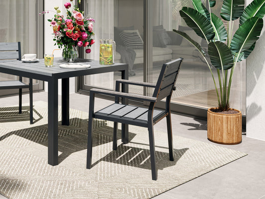 Set of 2 patio dining chairs with weather-resistant wicker, featuring beige cushions and a sturdy metal frame, perfect for outdoor dining.