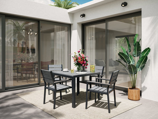 Modern outdoor dining set with a rectangular, glass-top table and four cushioned chairs in beige and brown wicker. Durable, weather-resistant materials perfect for patio or garden dining. Elegant and comfortable design.