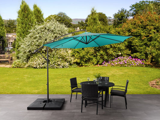 Turquoise 9.5ft tilting offset patio umbrella with sturdy metal frame, UV-resistant fabric, and crank lift system for easy adjustment, ideal for outdoor shade on patios, decks, and garden areas.