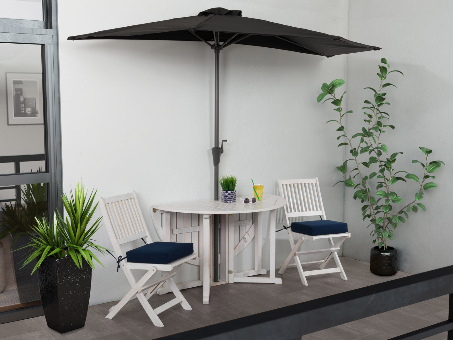 Black 8.5ft half umbrella with a durable metal frame, water-resistant polyester canopy, and crank handle for easy opening and closing, perfect for small patios and balconies.