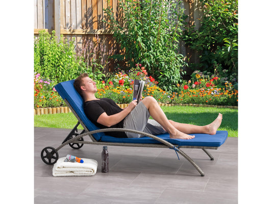 Grey wicker patio lounge chair with blue cushions, featuring a durable woven frame, weather-resistant fabric, and ergonomic design for outdoor relaxation. Ideal for garden, deck, or poolside seating.