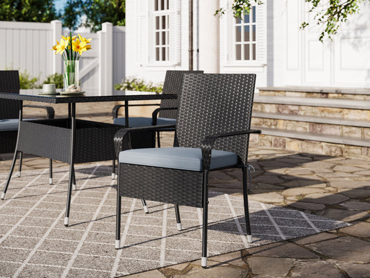 Black wicker stackable patio chairs with beige cushions, featuring a modern design, weather-resistant materials, and sturdy metal frames. Ideal for outdoor seating, garden, or balcony use. Set of 2.