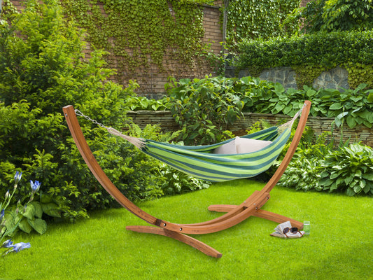Blue and green striped patio hammock with a sturdy wooden stand, featuring durable fabric and a comfortable design perfect for outdoor relaxation.