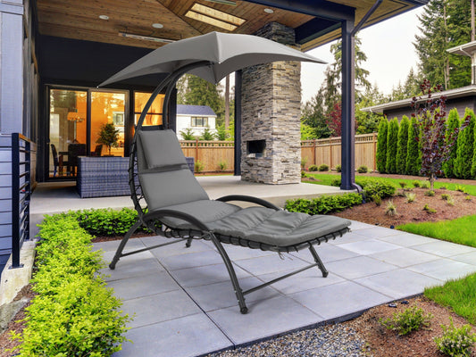 Grey patio lounge chair with canopy, featuring a sleek metal frame, comfortable cushioned seat, and adjustable reclining positions. Ideal for outdoor relaxation, UV-resistant fabric ensures durability and longevity.