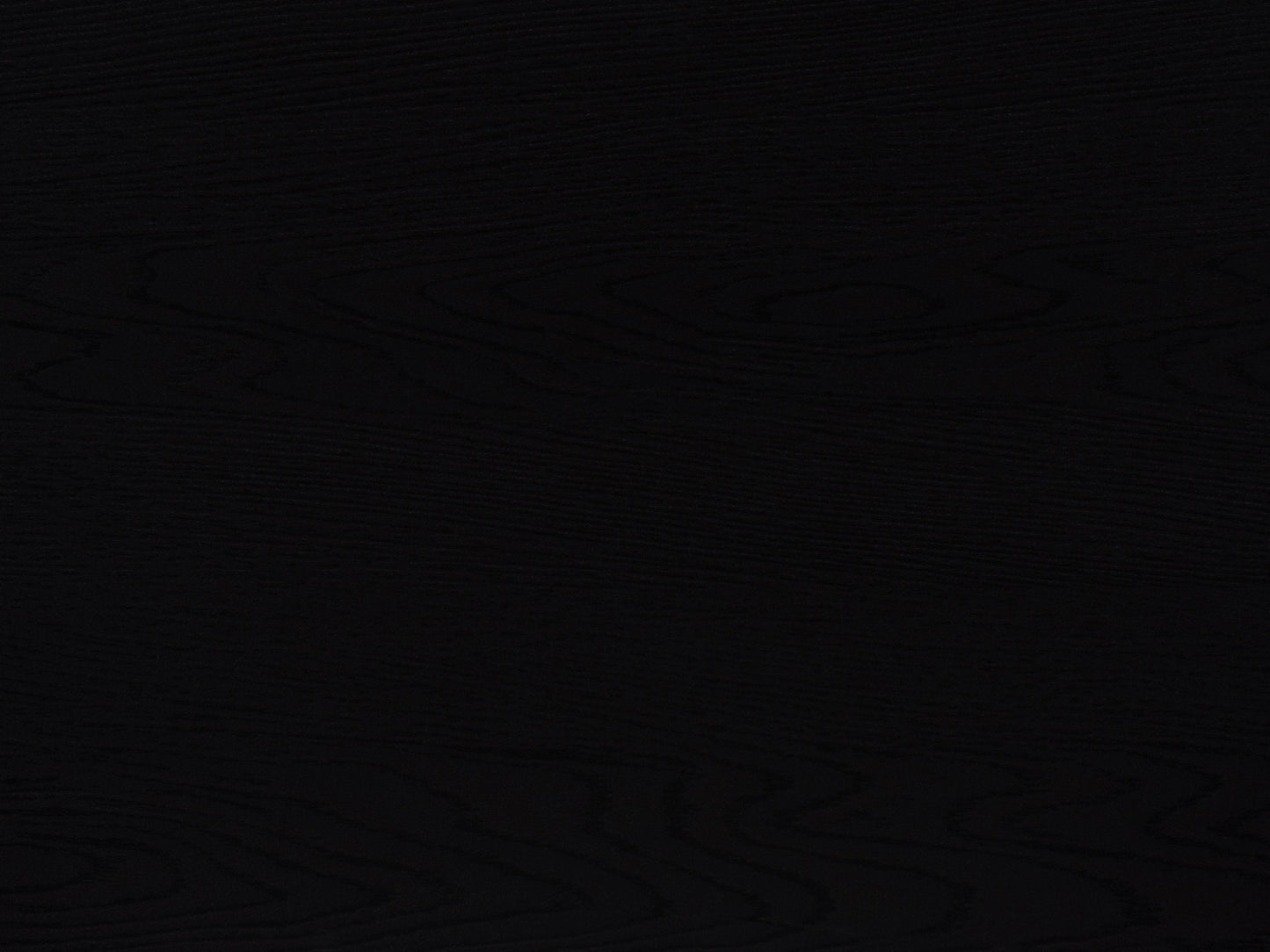 Modern modular TV stand in sleek black wood with adjustable shelves, cable management system, and sturdy metal legs, designed to support TVs up to 110 inches.