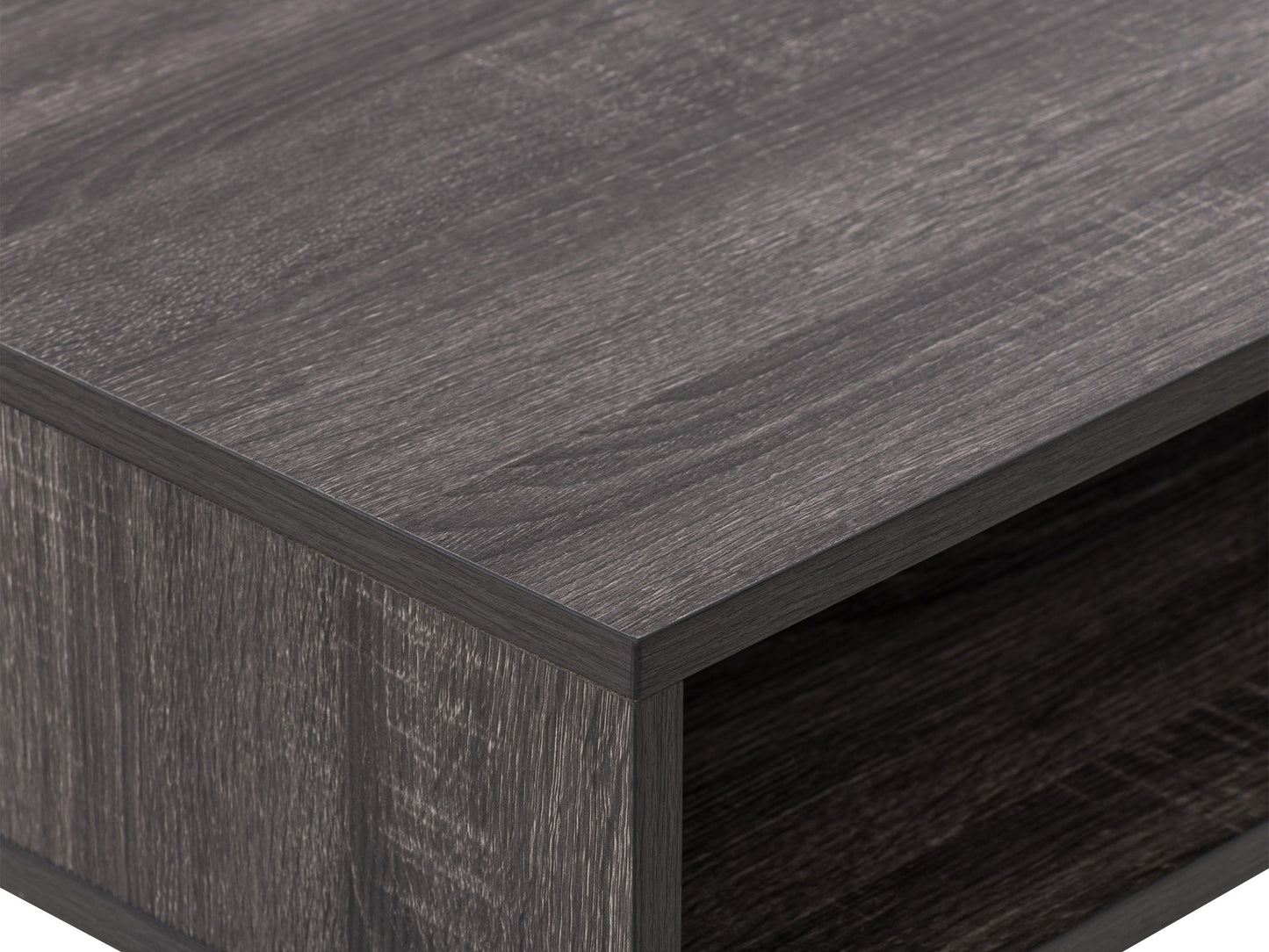 Sleek modern computer desk in grey with a smooth laminate surface, sturdy metal frame, and built-in cable management, ideal for home offices or workspaces.