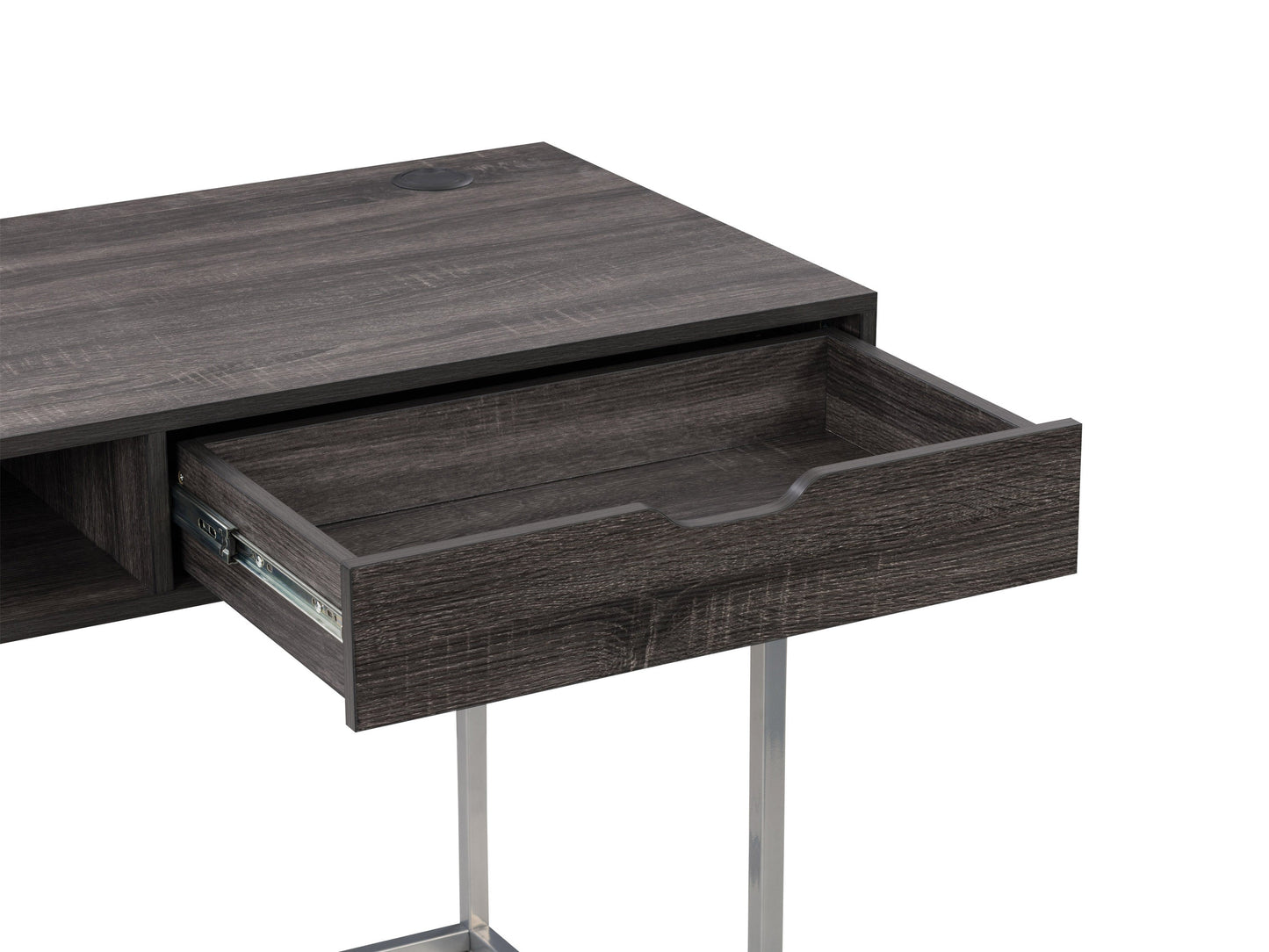 Sleek modern computer desk in grey with a smooth laminate surface, sturdy metal frame, and built-in cable management, ideal for home offices or workspaces.