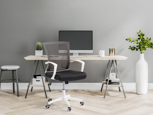 Ergonomic black mesh task chair with adjustable armrests, white frame, and lumbar support. Features breathable mesh back, cushioned seat, and swivel base with wheels for mobility. Ideal for home office use.