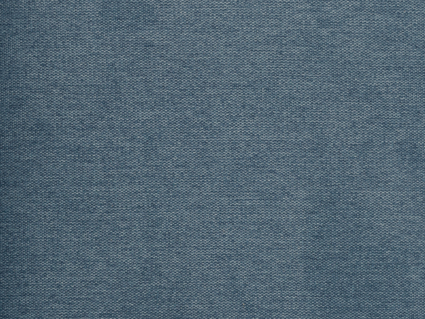 Gray fabric ottoman with tufted top, soft texture, and wooden legs, ideal for living room or bedroom decor.