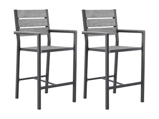 Set of two outdoor patio bar stools with teak wood seats, black metal frames, and footrests. The stools feature weather-resistant materials and a sleek, modern design, perfect for outdoor entertaining spaces.