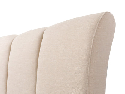 Cream channel tufted double/full bed with plush upholstery, sleek wooden legs, and elegant vertical stitching. Perfect for modern bedrooms seeking a blend of comfort and sophistication.