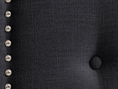 Dark grey padded headboard for twin/single bed, featuring tufted upholstery with soft fabric texture and sturdy construction. Ideal for modern bedroom decor.