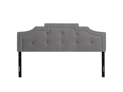 Light grey padded headboard for king-sized beds, featuring a tufted design with soft fabric upholstery and a plush, cushioned texture for added comfort and style.