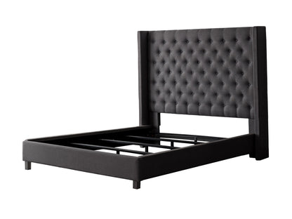 Dark grey tufted king bed with elegant button detailing on the headboard, upholstered in soft fabric. Sturdy wooden frame with sleek, modern design perfect for a contemporary bedroom.