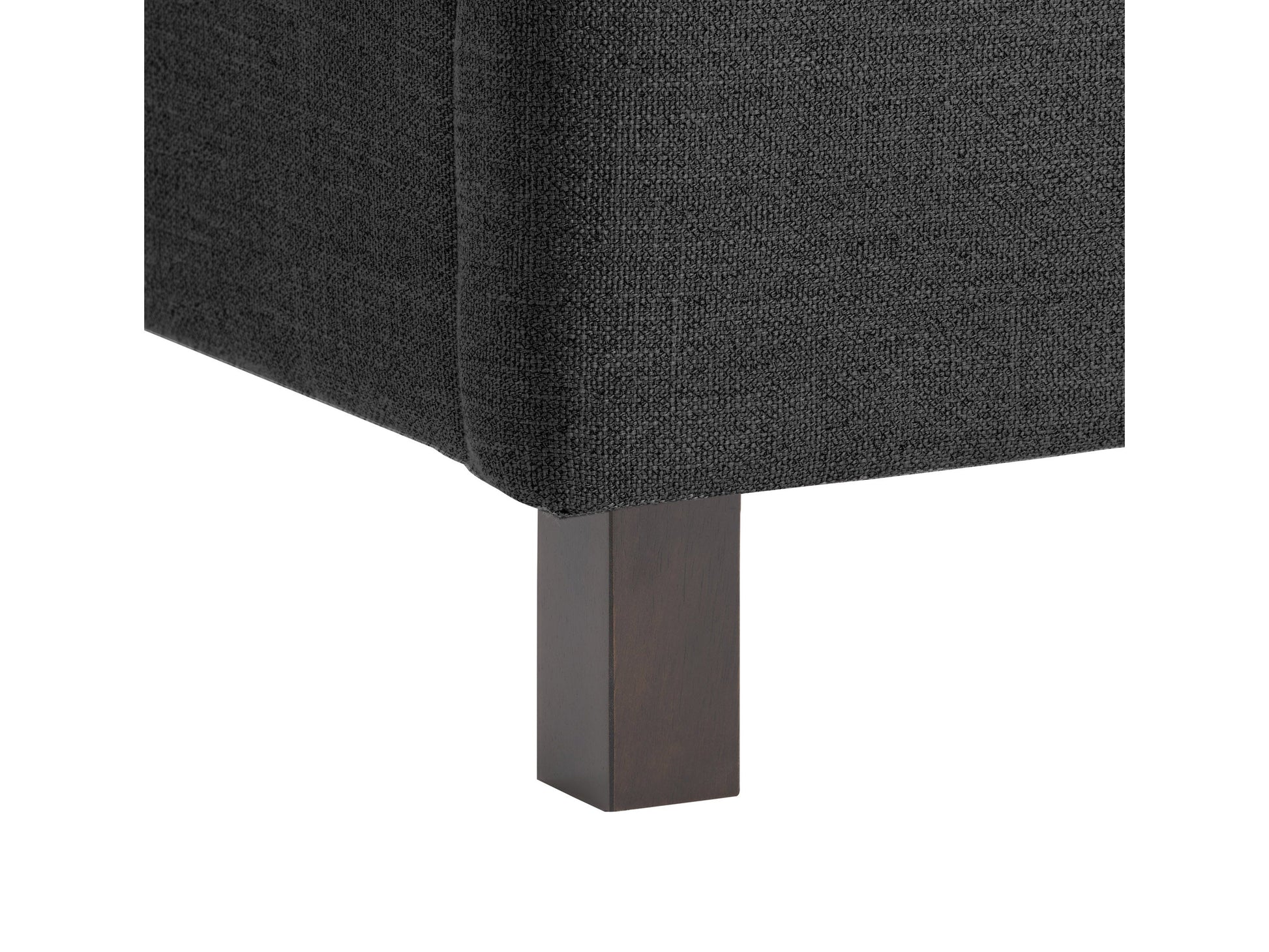 Dark grey tufted queen bed with plush upholstery, featuring a high, button-tufted headboard and sturdy wooden legs, perfect for modern bedroom decor.