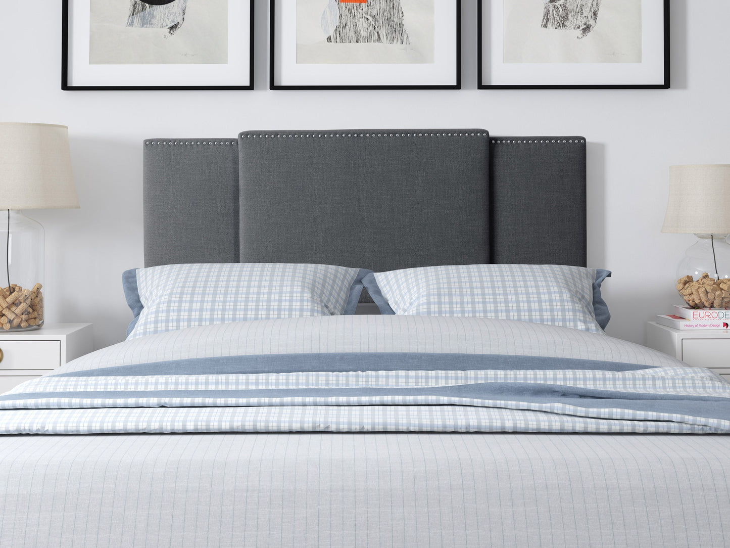 Dark grey adjustable headboard with tufted upholstery, sleek design, and soft fabric texture, suitable for queen and king size beds. Ideal for modern bedroom decor, offering customizable height settings.