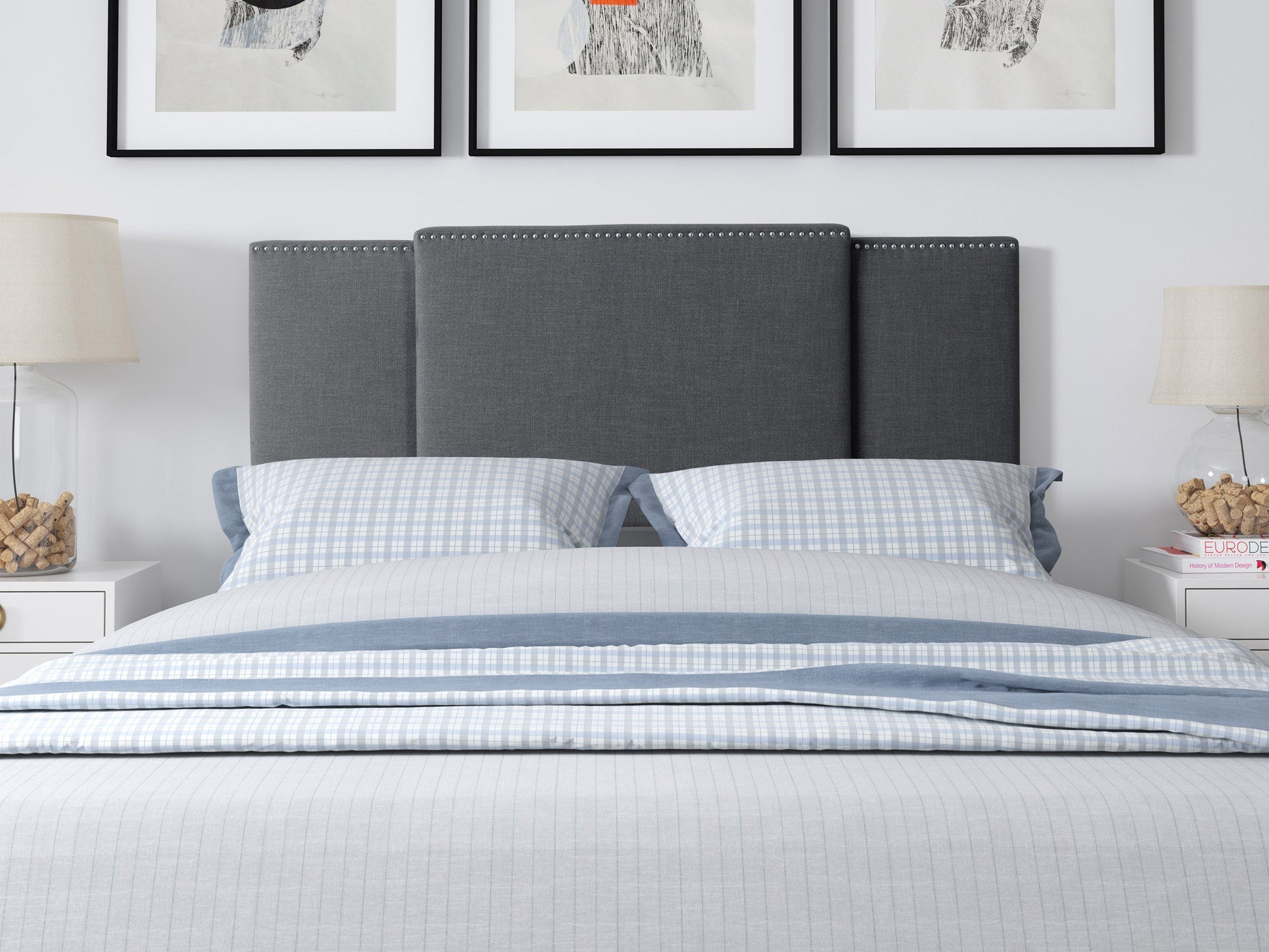 Dark grey adjustable headboard with tufted upholstery, sleek design, and soft fabric texture, suitable for queen and king size beds. Ideal for modern bedroom decor, offering customizable height settings.