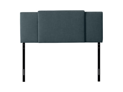 Blue adjustable headboard with tufted fabric, soft texture, and sleek design, perfect for modern bedrooms.