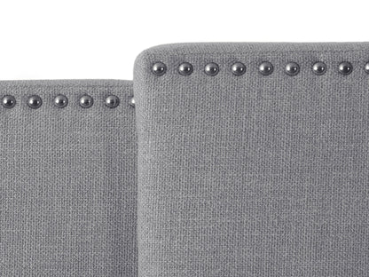 Adjustable grey headboard with tufted fabric, sleek design, and sturdy build, perfect for modern bedrooms.