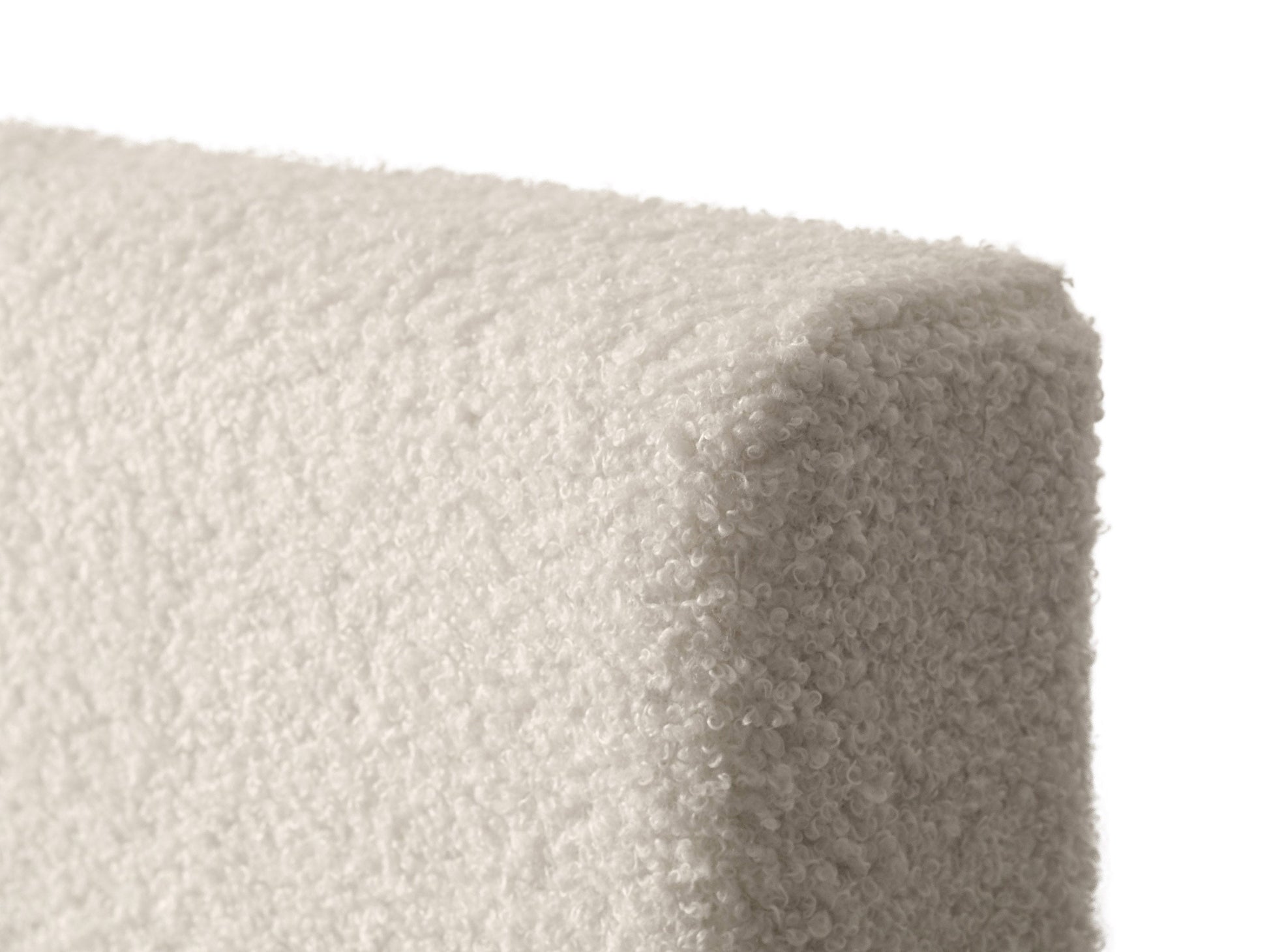 Cream boucle king bed with tufted headboard, wooden legs, and luxurious textured fabric. Perfect for modern bedrooms.