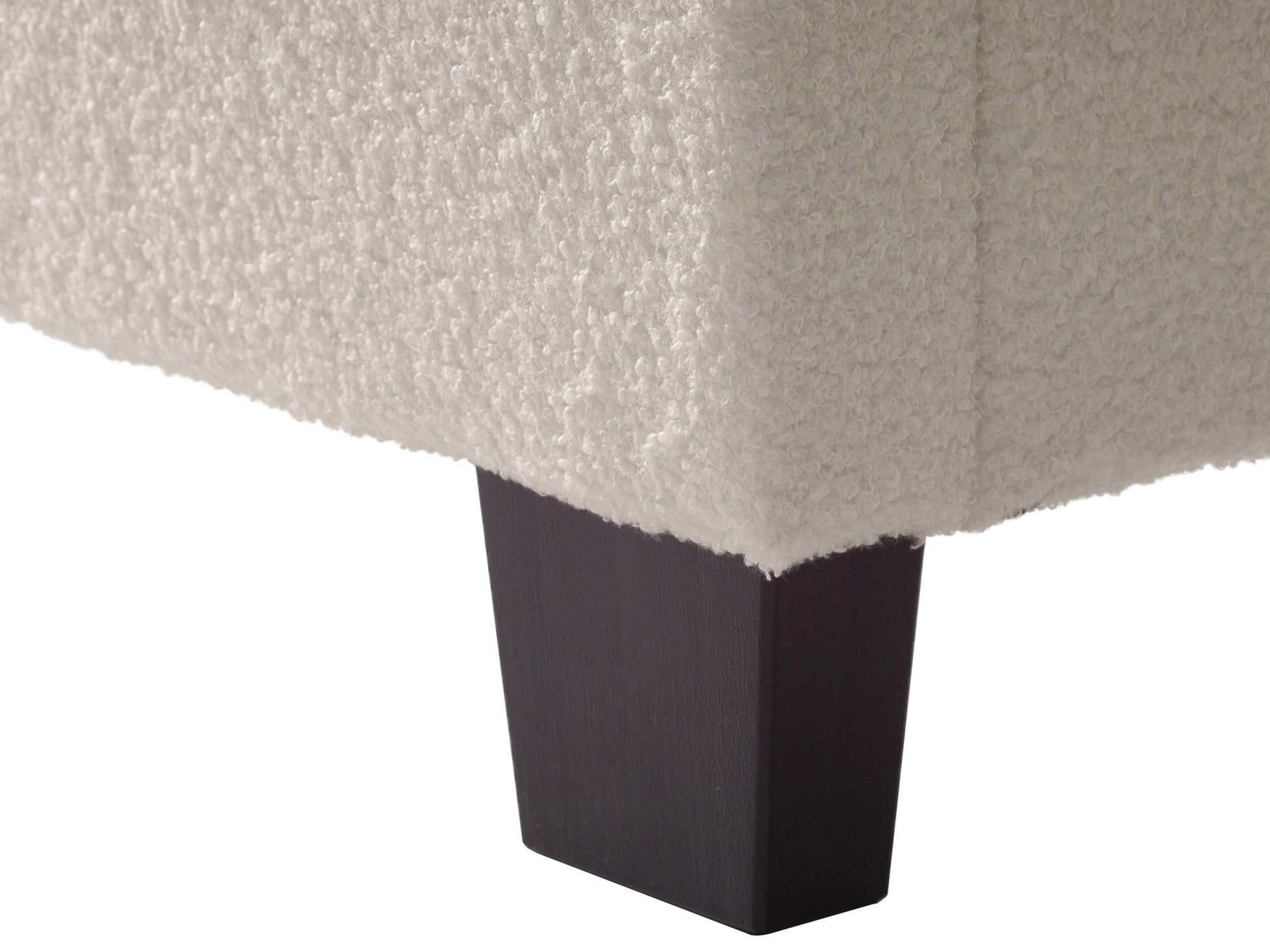 Cream boucle king bed with tufted headboard, wooden legs, and luxurious textured fabric. Perfect for modern bedrooms.