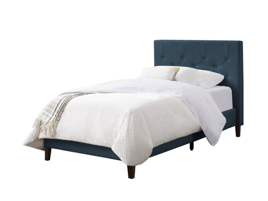 Blue button tufted twin bed with elegant headboard, soft velvet upholstery, and sturdy wooden legs, perfect for a modern bedroom.