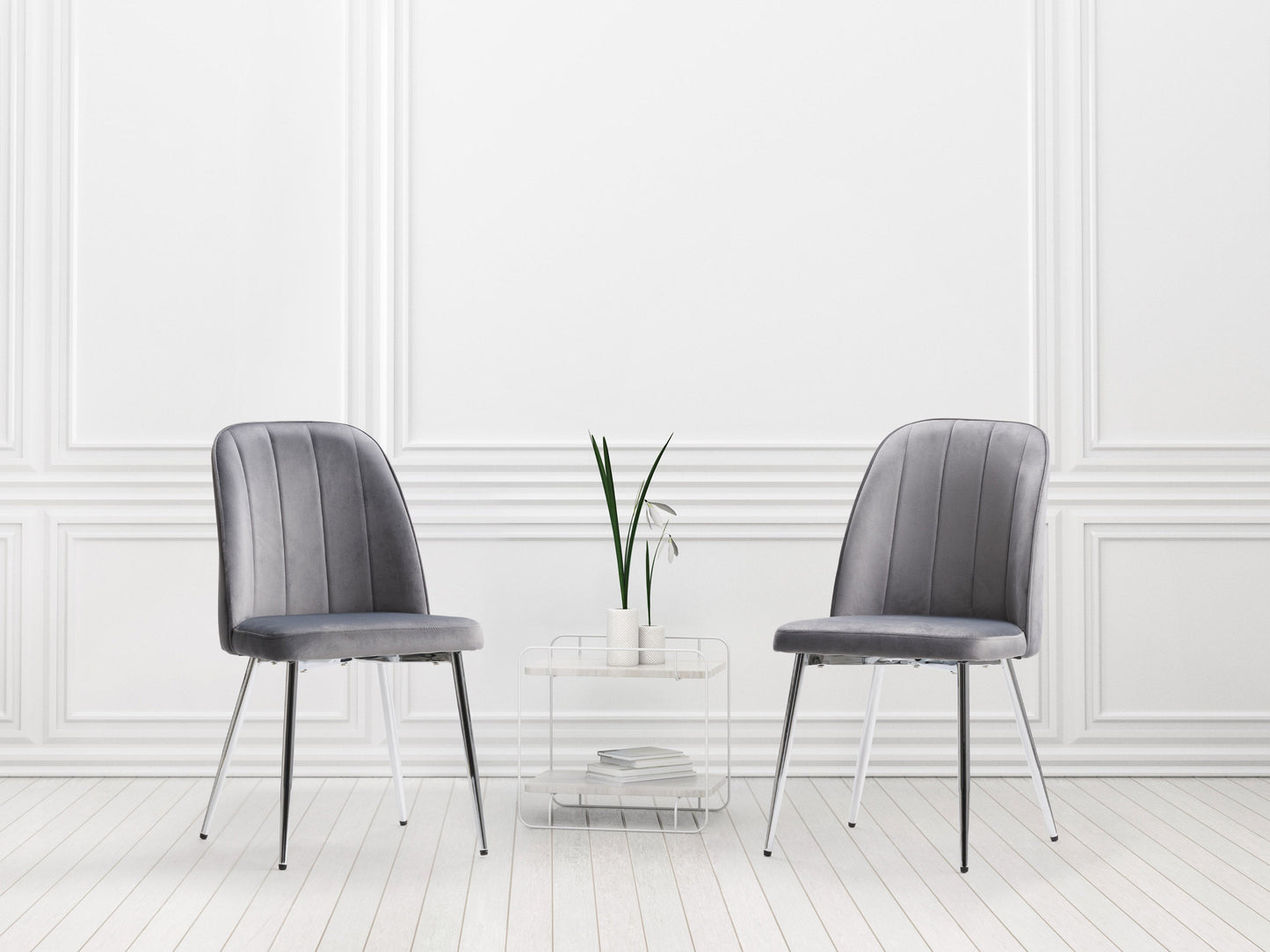Grey velvet dining room chairs, set of 2, featuring sleek metal legs, plush upholstery, and a modern design. Ideal for contemporary dining spaces, these chairs offer both comfort and style.